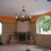 Chimenea ceradacon horno de leña en salón.