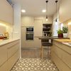 Cocina  blanca  moderna con muebles lisos, suelo hidraúlico y parqué