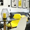 Comedor decorado en gris, amarillo y negro
