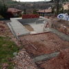Construcción de la solera en el entorno de la piscina.