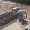 Construcción de muro de piedra