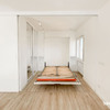 dormitorio cama abatible y cabecero integrado