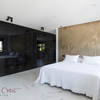Dormitorio principal con armario de cristal