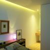 Dormitorio principal y baño