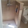 Ducha con muro de obra