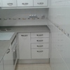 encimera con placa de induccion y basurero