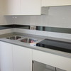 Encimera de cocina en Compac ceniza