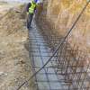 EXCAVACIÓN  Y CIMENTACIÓN DEL MURO