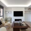 Libreria de pladur con tv y chimenea