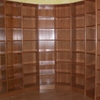 Librería semicircular  en madera de Cerezo, Vacía de libros.