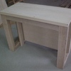 Mesa desplegable recogida al completo