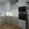 MUEBLES DE COCINA EN LAMINADO Y ENCIMERA KRION
