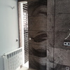Panelado pared y puerta corredera oculta con tablero especial aterciopelado
