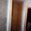 Pared divisoria entre ducha y mueble.