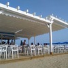 Pérgola de madera con toldo