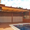 Pérgola de madera con toldo