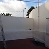 Pintura exterior de vivienda paredes y muros laterales