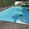 Piscina climatizada con bomba calor al fondo
