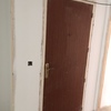 Puerta de entrada antes del panelado