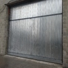 Puerta exterior acceso nave batiente galvanizada