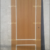 Puerta moldurada antes de lacar