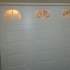 Puerta seccional de cuarterones con visores