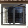 Rejas para ventana con abertura.