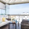 Terraza con cerramiento de vidrio