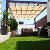 Terraza con césped artificial