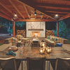terraza con chimenea y revestimiento Dekton