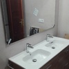 Toallero colgante sobre mueble