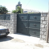 Valla de bloques de granito + la puerta de garaje automatica