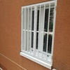 VENTANA CON REJA