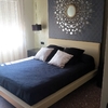 Vista cama y panel