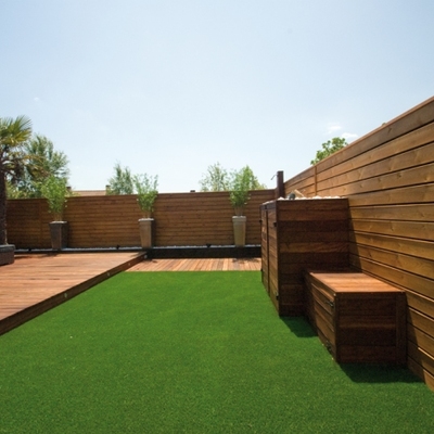 Vallado o cerramiento de pequeño jardin con madera - Balcón de Malaga