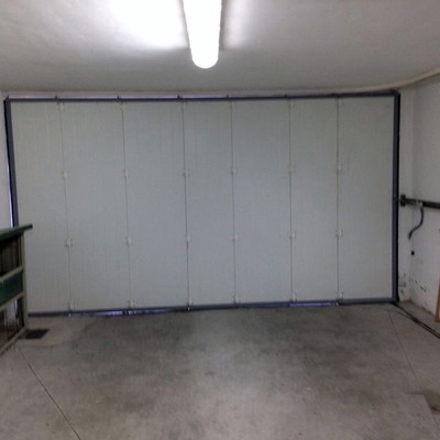 Reparacion puerta de garaje seccional lateral - Boadilla (Madrid