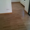 Suministro e instalación de parquet industrial en vivienda