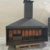Base de barbacoa y su salida en el techo para chimenea