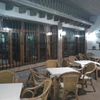 Cortina de cristal entre comedor y terraza
