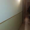 Tapiar una puerta del salón y abrir otra puerta más grande y corredera quitar puerta del pasillo y hacer un arco arriba en la parte de arriba hacer un armario empotrado en la entrada