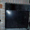 Instalar puerta de chimenea