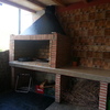 Chimenea exterior que revoca humo