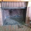 Instalar puerta de hierro para chimenea con cristal