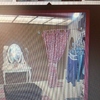 Barra probador tienda ropa