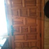 Puerta de acceso a vivienda en pino