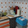 Hacer la cocina nueva, tapando el alicatado con vinilico- el resto hacerlonuevo