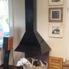 Instale una estufa de leña en una chimenea