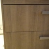 Cambio de madera lateral de un mueble bajo de cocina
