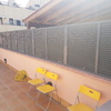 Valla de lama mallorquina fija de aluminio en color ral 7012 de 8.65m de largo por 1m de alto