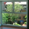 Convertir puerta halconera en ventanas con cristal fijo inferior